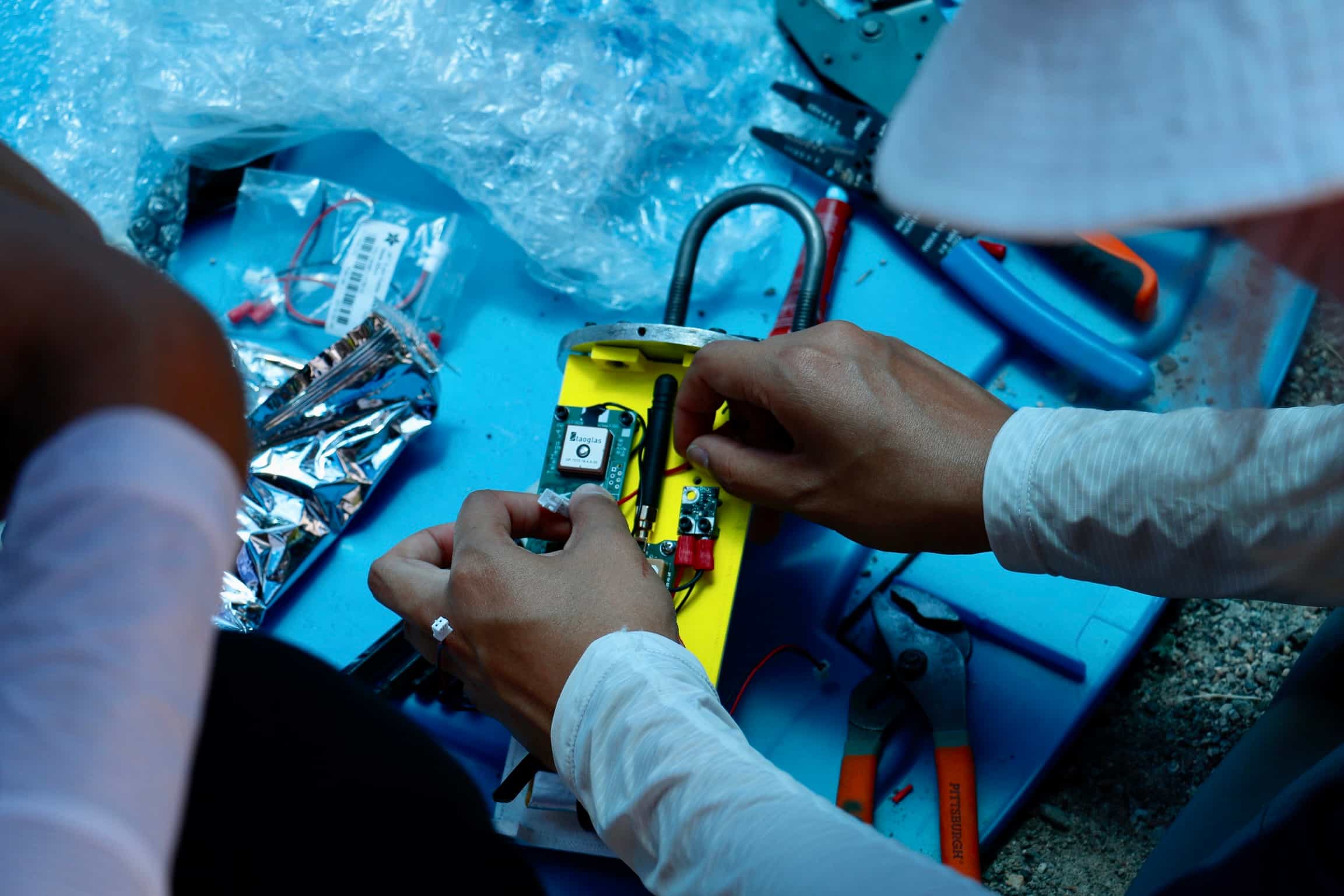 members working on the avionics