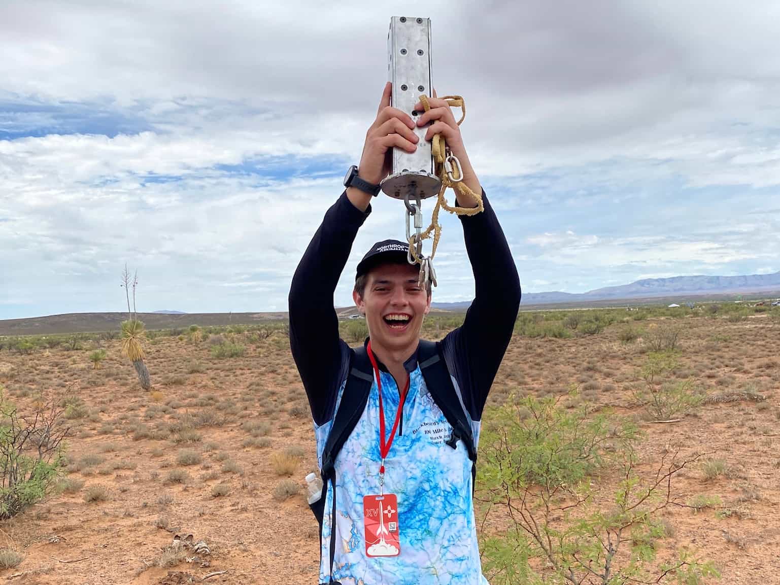 team member holding payload